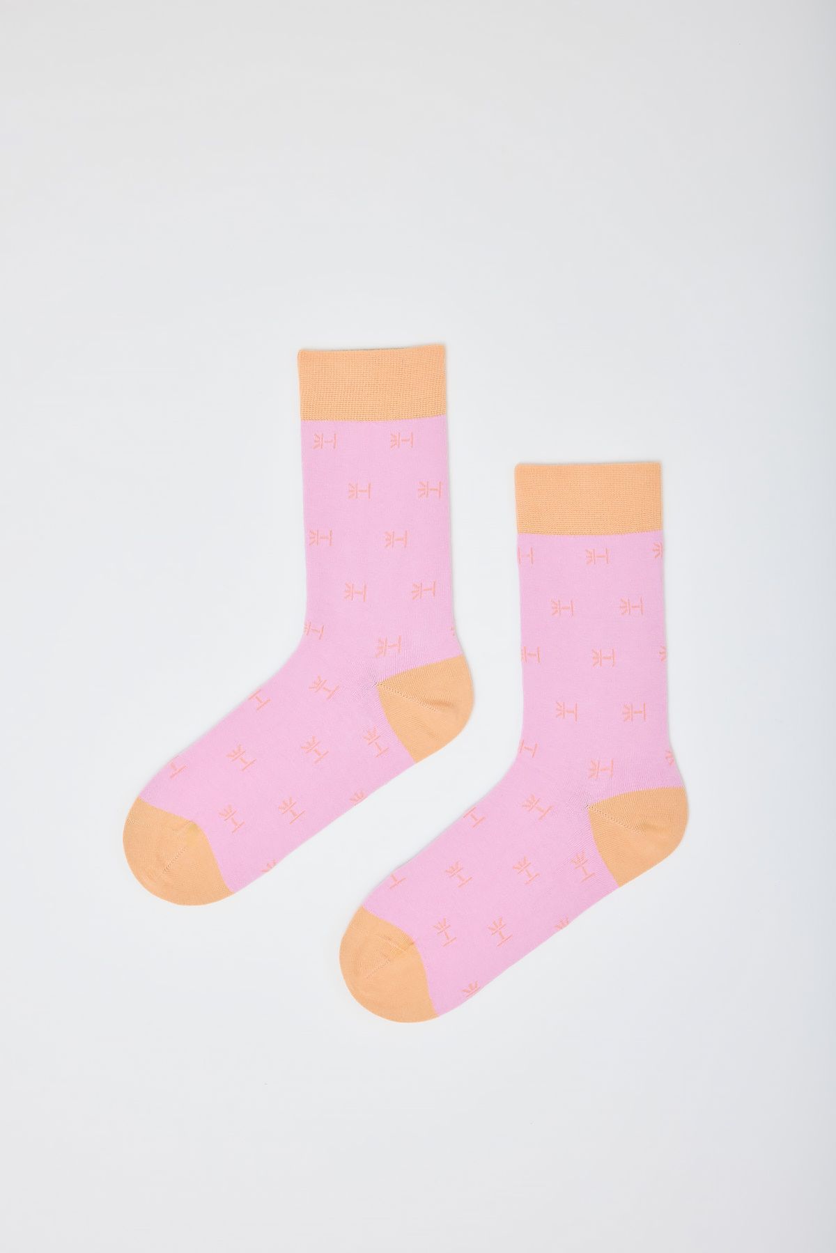 Rosa-/apricotfarbene USB-Merchandise Socken